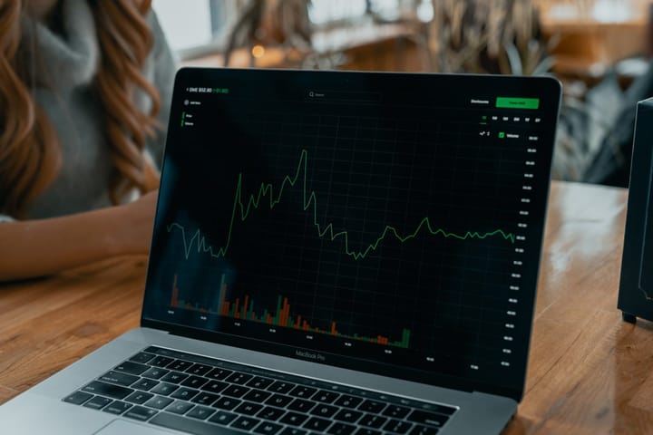 laptop showing a stock chart
